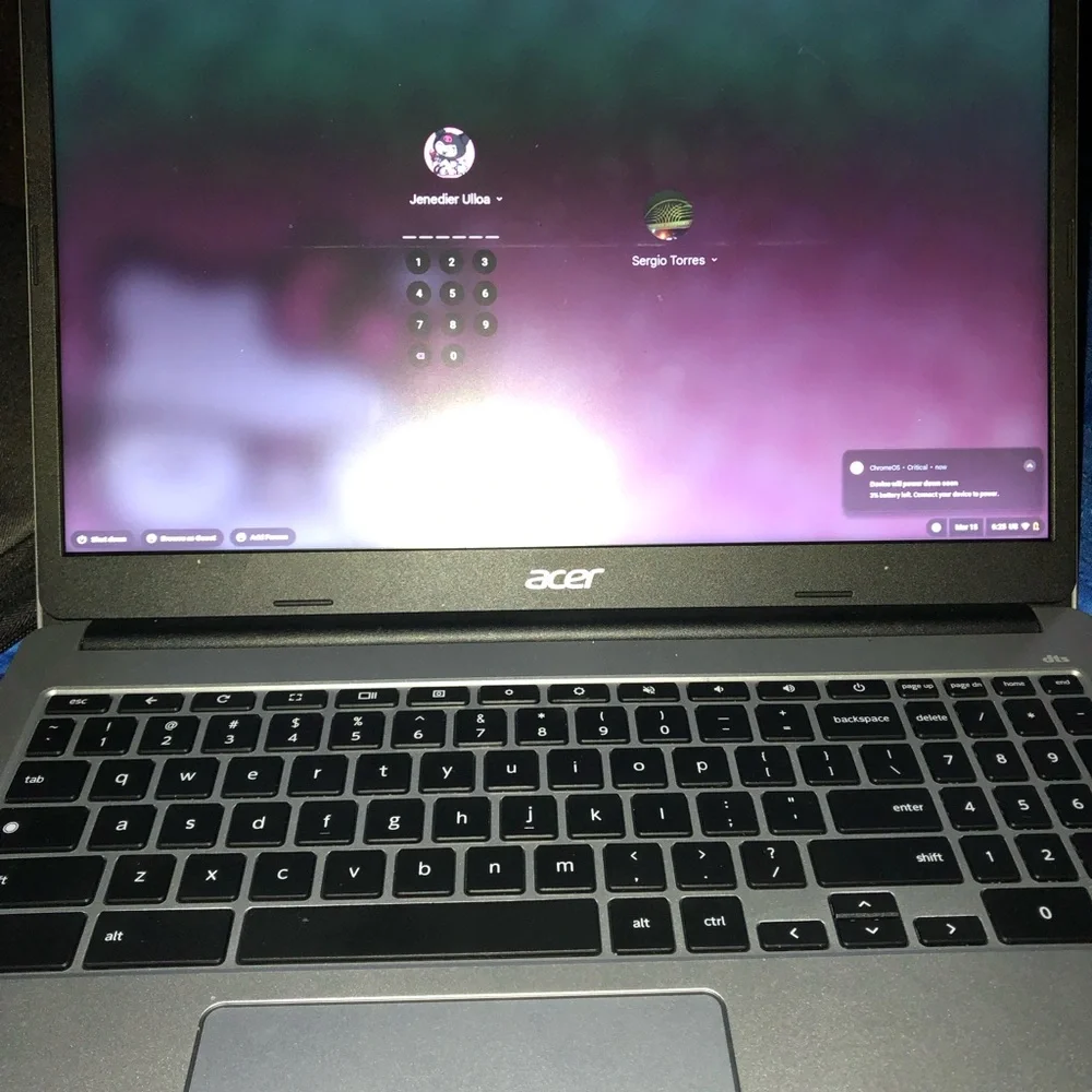 Gray Chromebook with Black Sleeve